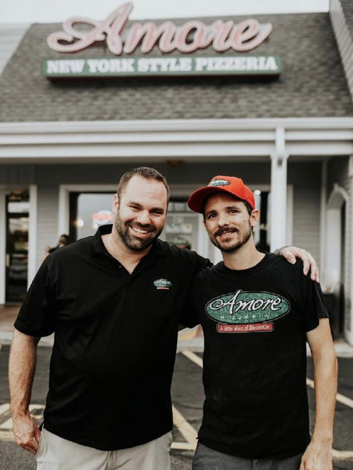 Chris Simone and his brother outside Amore Pizzeria in Zionsville, Indiana